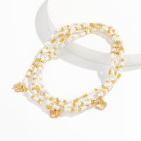 White Beaded Waist Chain with Gold Butterfly