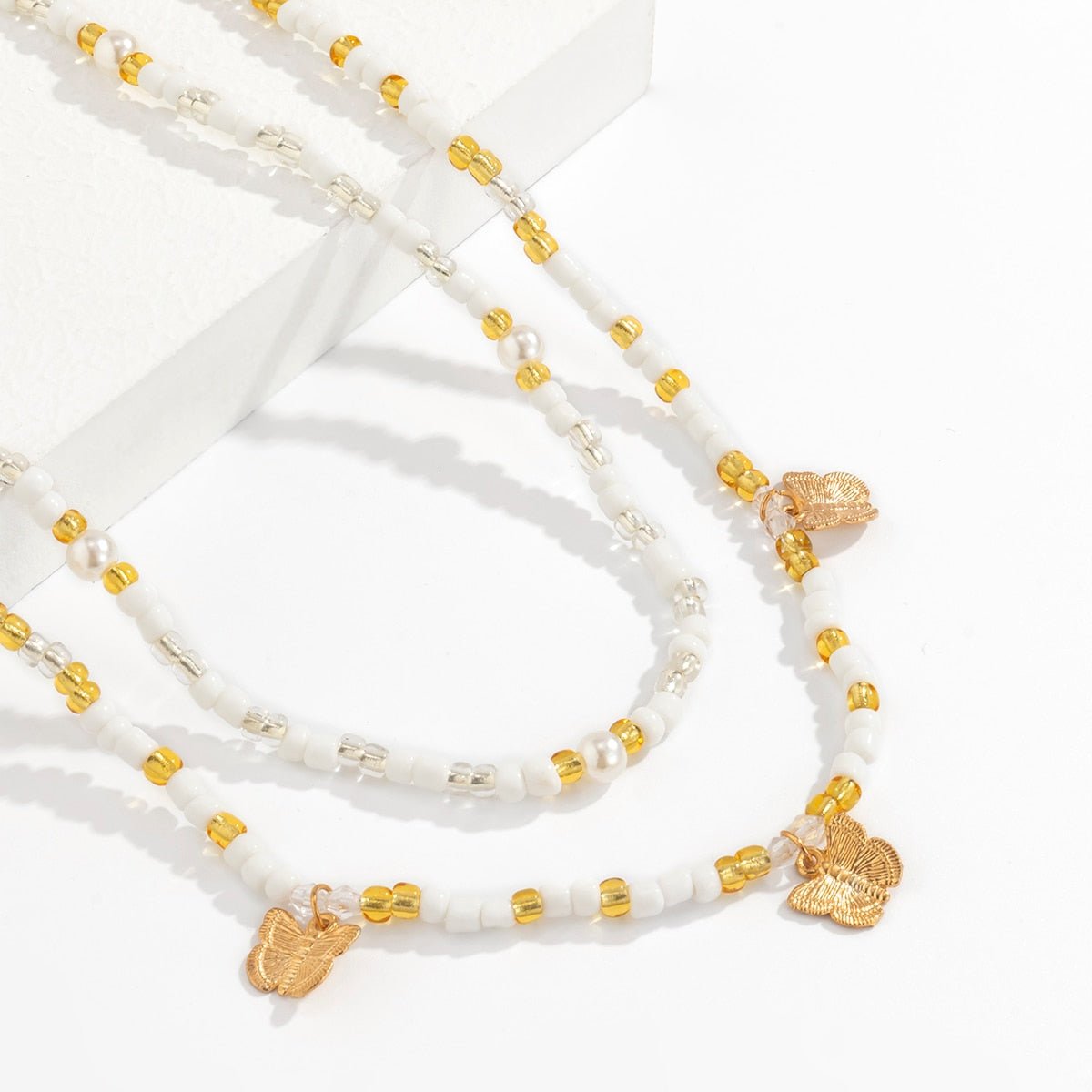White Beaded Waist Chain with Gold Butterfly